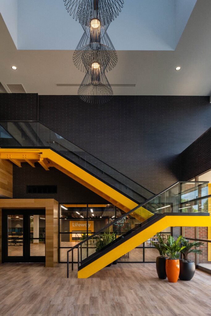 architect visioneering studios designed a beautiful entrance for lifeway christian resources so the team or visitors could be wowed the minute you walk into the space