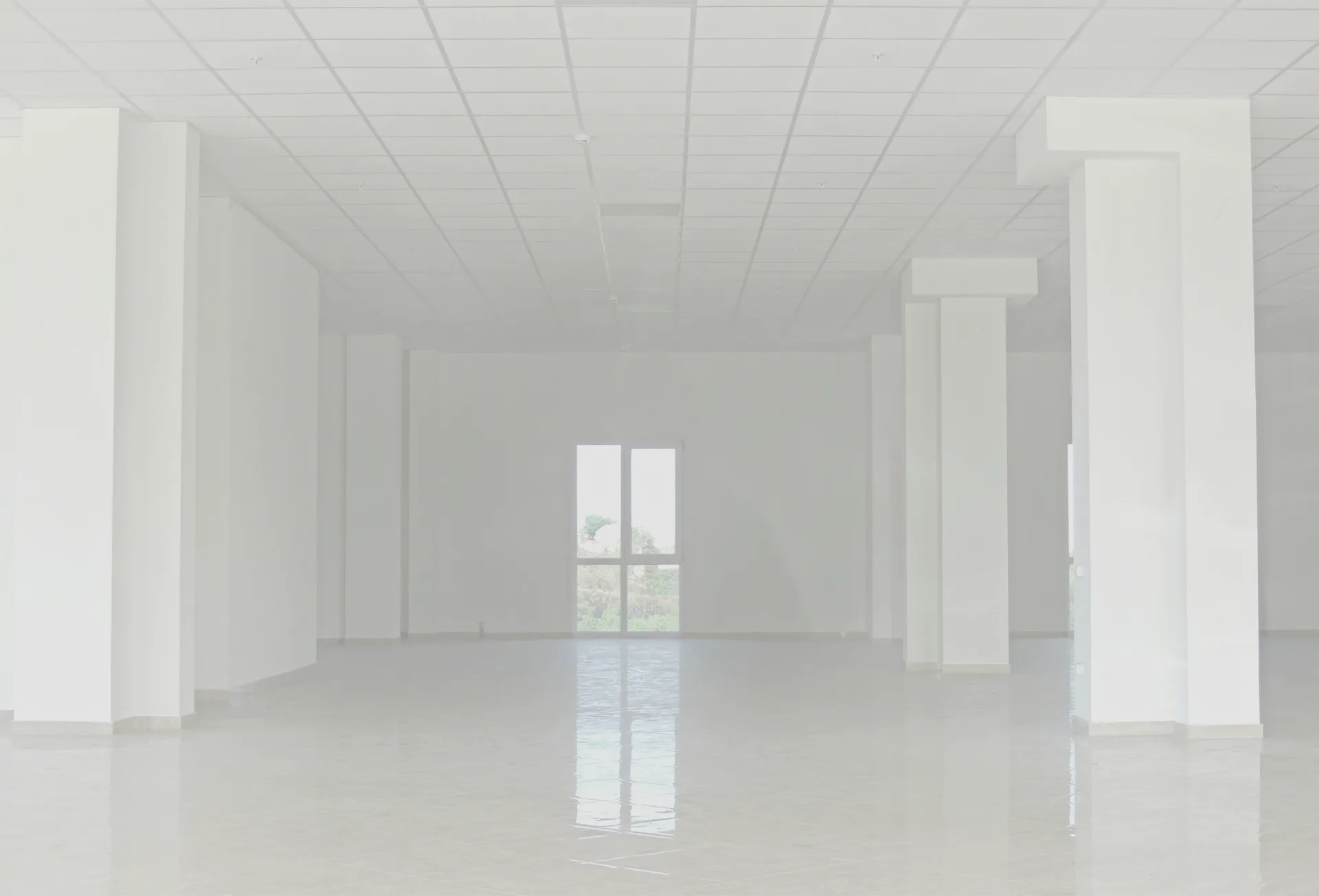 photo highlights finished floors, lights on… but no chairs, no tech, no signage. Visually communicates: “We built the building—but forgot to make it usable. - church building design mistakes