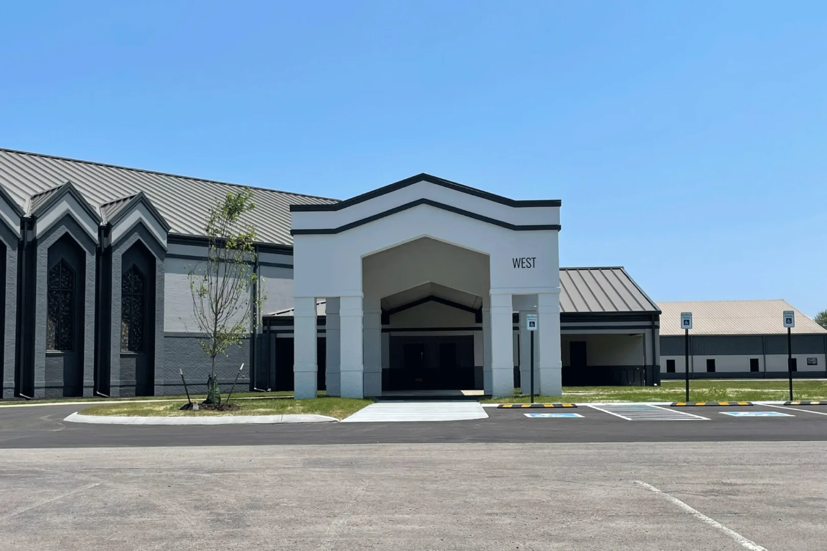 Journey Church west entrance renovation featuring new canopy structure, enhanced accessibility, and updated exterior aligned with the church’s rebrand.
